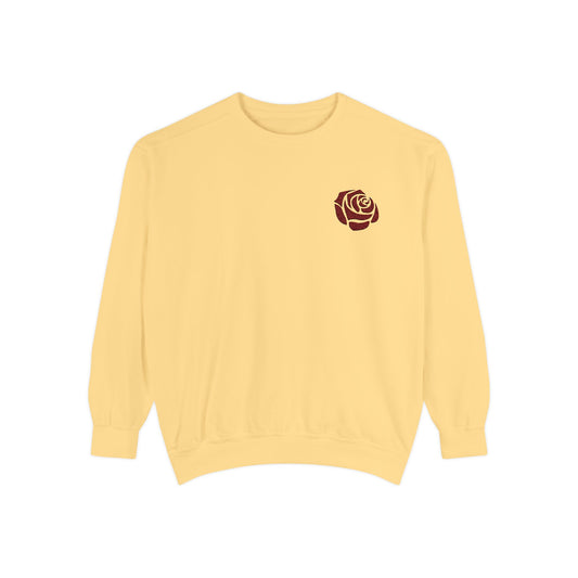 Yellow sweatshirt with a red rose emblem on a white background